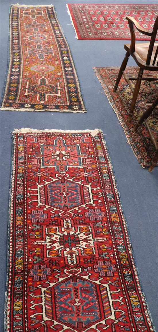 Two Persian red ground runners, 250 x 69cm & 170 x 66cm